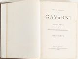 a book open on a white surface with a title in the middle