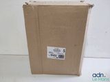 a box with a label on it sitting on a white surface