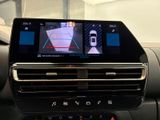 a picture of a car dashboard with a camera mounted on it