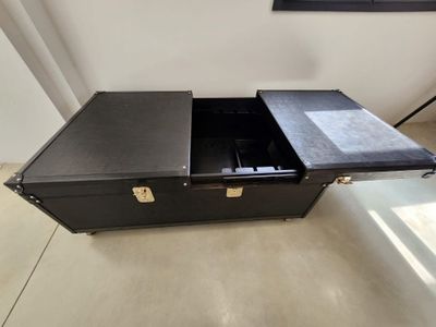 an image of a black briefcase with a drawer