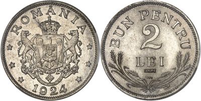a silver coin with a crown on top of it