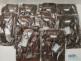 many bags of brown clothing sitting on a table