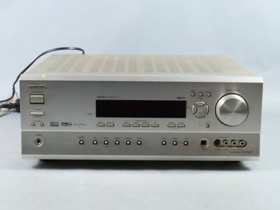 an image of a close up of a stereo receiver on a table