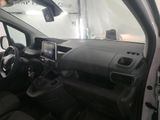 a picture of a car inside of a building