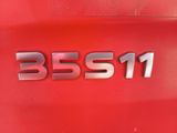 the rear end of a red car with the word bss11 on it