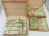 a wooden box that has many different types of tiles in it