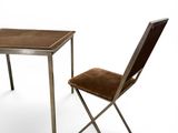 two chairs and a table on a white background with a white background