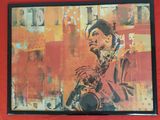 painting of a man playing a saxophone on a red wall