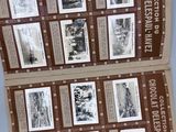 several old photos of people in the snow are on a table