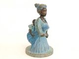 a statue of a woman holding a baby in her arms