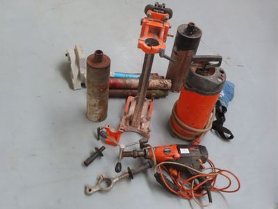 a lot of tools that are laying out on the floor