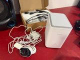 an image of a box of electronics sitting on a red table