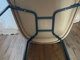 a chair that is sitting on a hard wood floor