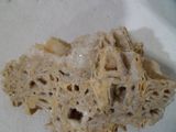 a close up of a piece of bread on a table