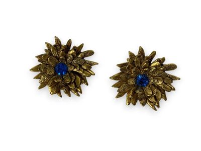 a pair of gold tone earrings with blue stones