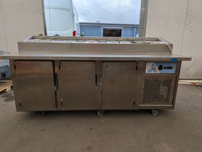 an image of a stainless steel counter top in a warehouse