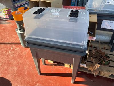 a small table with a remote control on top of it