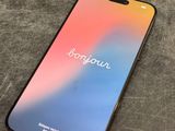 a close up of a phone on a table with a blurry background
