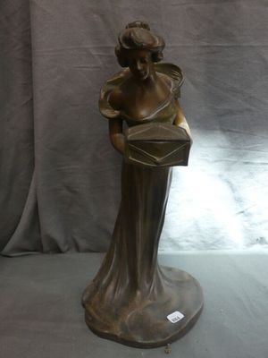Statuette-baguier en métal à double patine verte et brune fi…