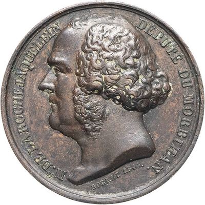 an old coin with a man ' s face on it
