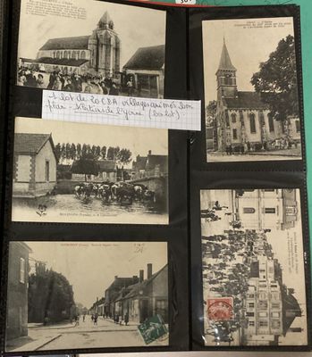 une vieille photo en noir et blanc représentant un livre avec des illustrations d'une église
