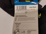 the back of a pair of black gloves with a blue tag on it