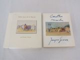deux livres posés sur une table blanche, avec la photo d'un homme et d'une femme