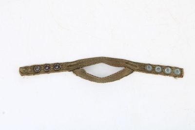 an image of a piece of clothing with buttons on it