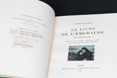 an open book with a picture of a man on it