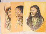 three paintings of native indian men are displayed on a table