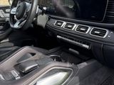 the interior of a mercedes s - class car with a view of a building in the background