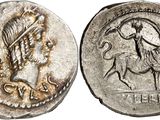 a silver coin with an image of a man on a horse