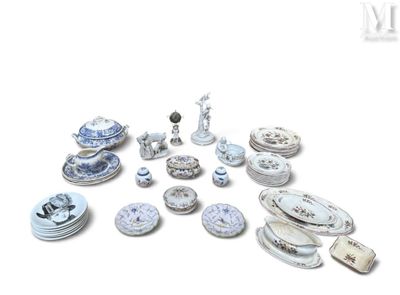 a lot of plates and bowls that are sitting on a table