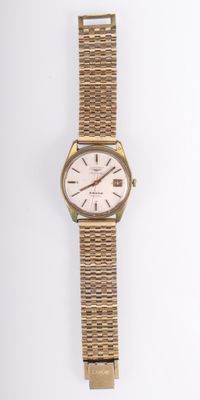 une image d'une montre-bracelet en or avec un cadran blanc