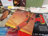 a lot of records on a table with a lot of them