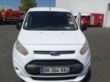 the front of a white ford transit van parked in a parking lot