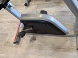 a close up of a stationary exercise bike on the floor
