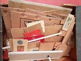 a box full of cardboards and a toothbrush in it