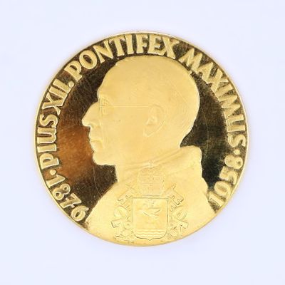 une image représentant une pièce d'or sur laquelle figure le portrait d'un homme