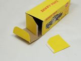 a yellow box that has a piece of paper in it