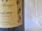 a bottle of wine that is sitting on a table