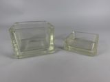 pair of clear glass square vases with a clear base