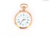 a gold pocket watch with roman numerals on the face