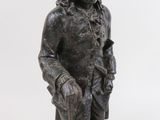 pair of bronze figurines of a man and a woman