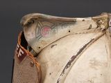 a close up of a helmet with a tag on it