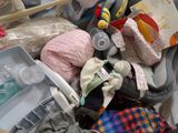 a pile of baby items that are on the floor