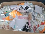 a cardboard box filled with many different types of items