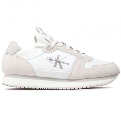a close up of a pair of sneakers on a white background