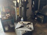 an image of a garage with a lot of tools