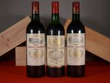 three bottles of wine sitting next to each other on a table